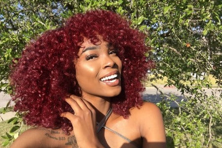 Rock on in Style with a Red Afro Wig: Bold, Beautiful, and Unforgettable